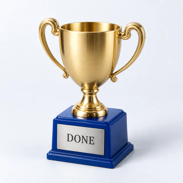 Small satin gold trophy cup on a cobalt base with a silver Done plaque